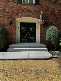Broom finish concrete front porch with rubbed steps in Carmel Indiana – Indy Decorative Concrete
