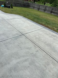 Broom finish concrete patio with Storm Gray hardener border in Fishers Indiana – Indy Decorative Concrete