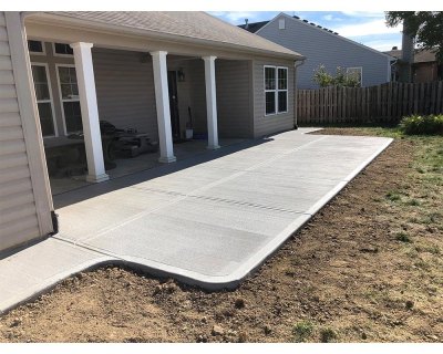 Gray broom finish concrete with tooled joints and broom retrace in Avon Indiana – Indy Decorative Concrete