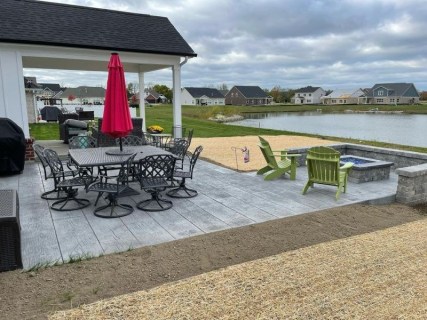16-inch Gilpins Falls Bridge Plank stamped concrete with Gull Gray integral and Charcoal release in New Palestine Indiana – Indy Decorative Concrete