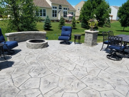 Orchard Stone stamped concrete with Pewter integral, Storm Gray release and seat wall in the Indianapolis area – Indy Decorative Concrete