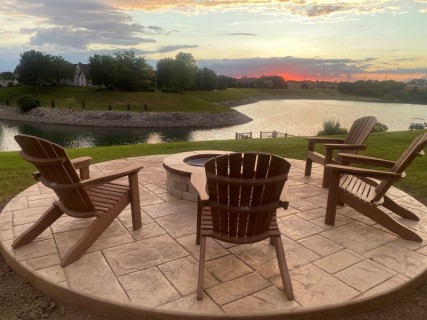 Majestic Ashlar Slate stamped concrete with Harvest Wheat integral, Colina Tan release and wood-burning fire pit with custom top cap – Indy Decorative Concrete