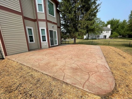 Appalachian Flagstone stamped concrete with Lanon Stone integral and Russet release in Fishers Indiana – Indy Decorative Concrete