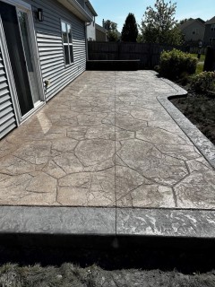 Appalachian Flagstone stamped concrete with Autumn Oak integral, Storm Gray release and Storm Gray hardener border – Indy Decorative Concrete