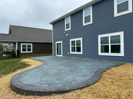Appalachian Flagstone stamped concrete with Blue Smoke hardener, Charcoal release and Storm Gray hardener border in Greenfield Indiana – Indy Decorative Concrete