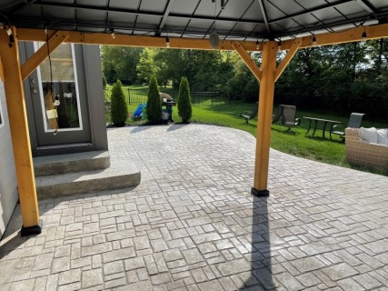 Appalachian Flagstone stamped concrete with Bone hardener, Smoke release and stone liner steps in Indiana – Indy Decorative Concrete