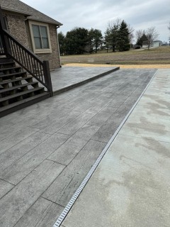 16-inch Gilpins Wood Plank stamped concrete with Gull Gray integral and Charcoal release in Greenwood Indiana – Indy Decorative Concrete