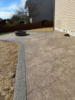 Appalachian Flagstone stamped concrete with Autumn Oak integral, Smoke release and Storm Gray hardener border in Hamilton County Indiana – Indy Decorative Concrete