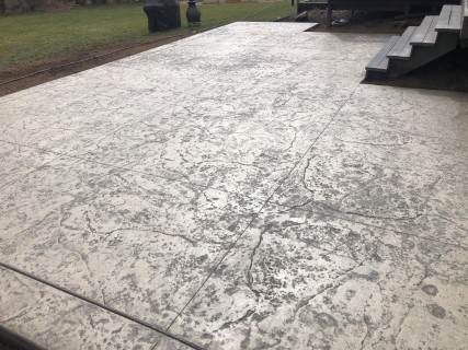 Heavy Stone stamped concrete with Lanon Stone integral, Charcoal release and tooled border with no color change in Indianapolis – Indy Decorative Concrete