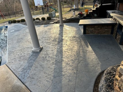 Heavy Stone Stamped Concrete Patio with Pewter Integral and Storm Gray Release in Indianapolis, Indiana - Indy Decorative Concrete