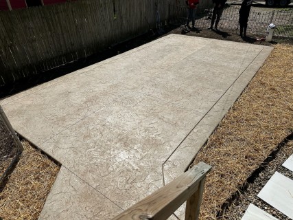 Oxford slate stamped concrete patio with Lanon stone texture and colina tan color featuring tooled border in Indianapolis Indiana – Indy Decorative Concrete
