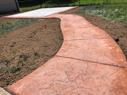 Oxford Slate stamped concrete with Terra Cotta hardener walkway and Storm Gray release in Indiana – Indy Decorative Concrete