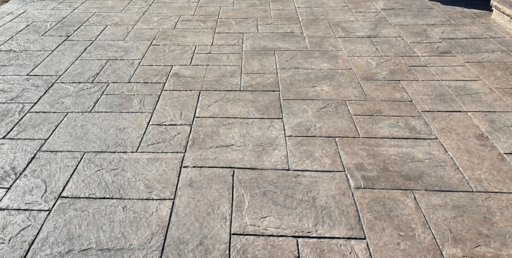 Majestic Ashlar Slate stamped concrete pattern used for patios, walkways, and outdoor living spaces.